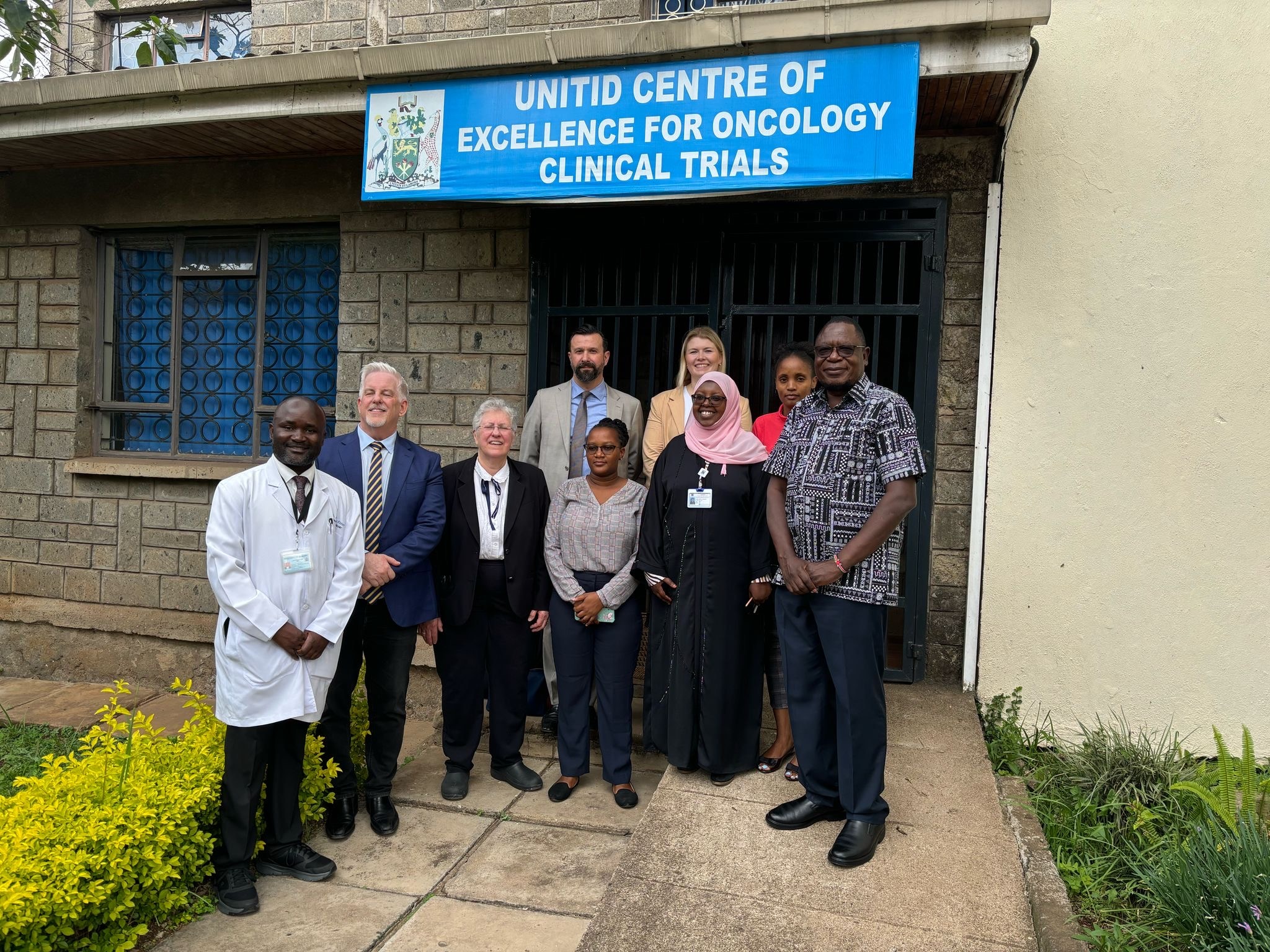2024–2025 AACR President Patricia M. LoRusso meeting with leaders in cancer research and patient care during a listening tour in Kenya