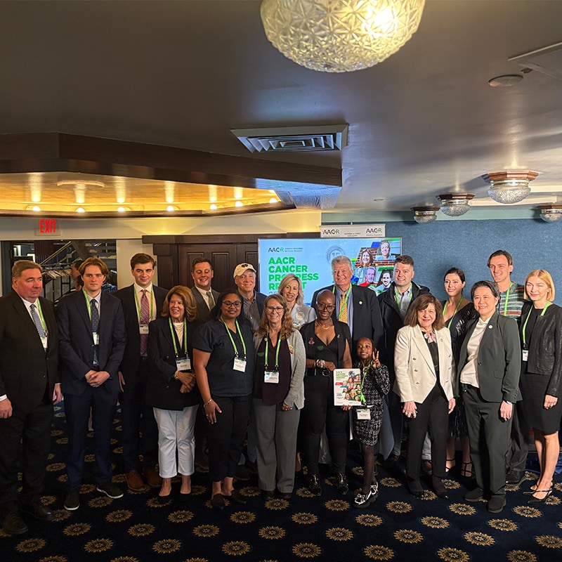 Panelists, survivors, and their families gather at the briefing to release the AACR Cancer Progress Report 2025