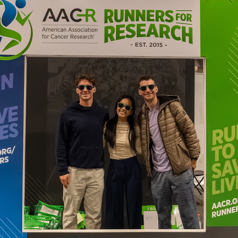 Members of the Runners4Research team picking up their gear before the 2025 Philadelphia Marathon